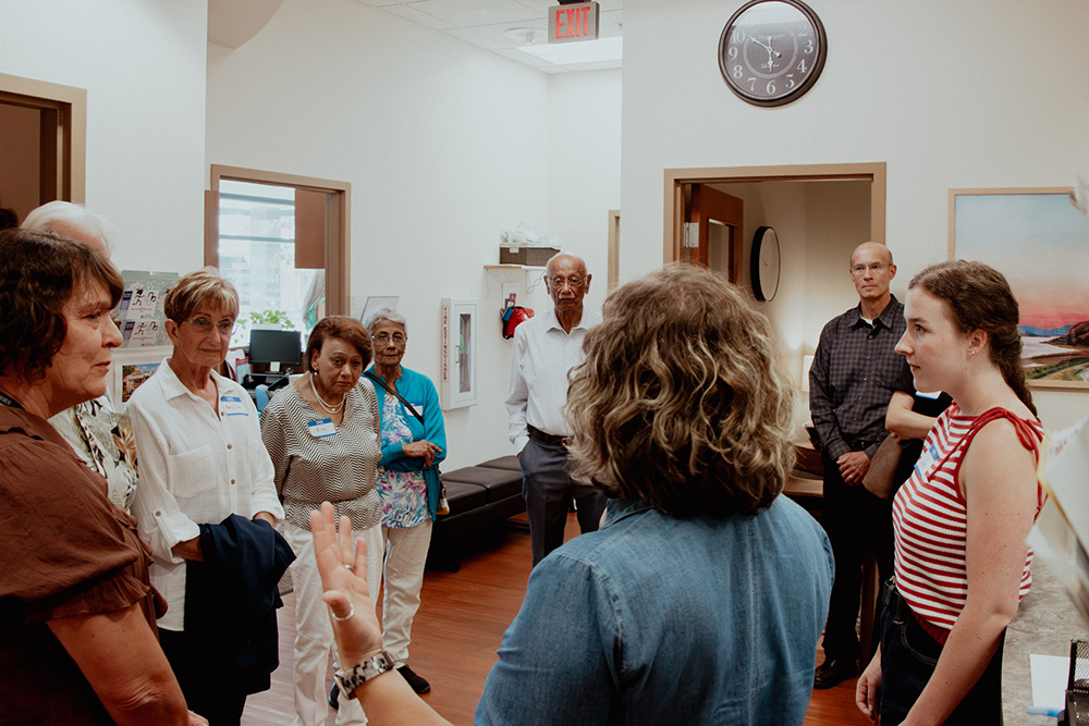 Compassion Dinner participants taking a tour.